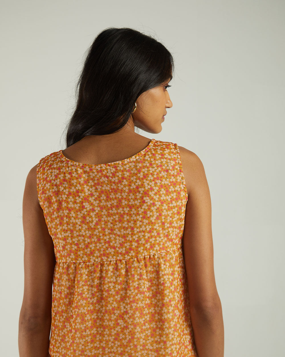 Yellow Floral Sleeveless Crop Top at Kamakhyaa by Reistor. This item is Bemberg, Casual Wear, Chiffon, Crop Tops, Natural, Prints, Tops, Womenswear, Yellow