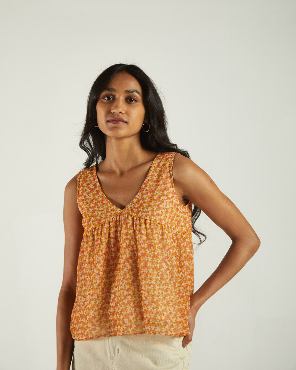 Yellow Floral Sleeveless Crop Top at Kamakhyaa by Reistor. This item is Bemberg, Casual Wear, Chiffon, Crop Tops, Natural, Prints, Tops, Womenswear, Yellow