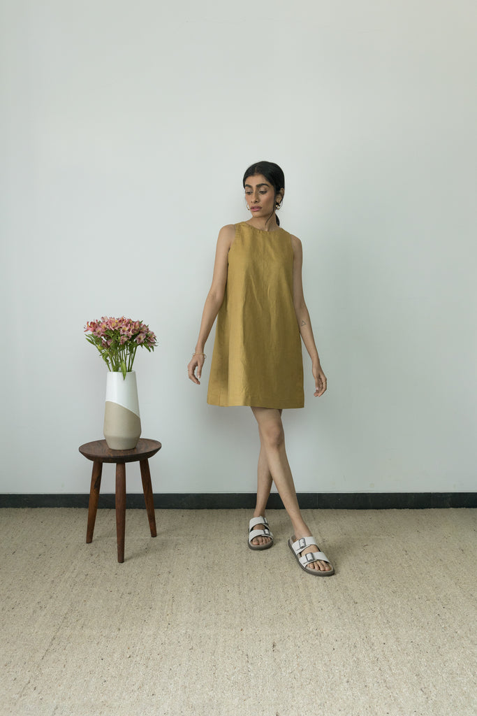 Yellow Flowy Mini Dress at Kamakhyaa by Anushé Pirani. This item is Casual Wear, Cotton, Cotton Hemp, Handwoven, Hemp, Mini Dresses, Regular Fit, Shibumi Collection, Sleeveless Dresses, Solids, Womenswear, Yellow