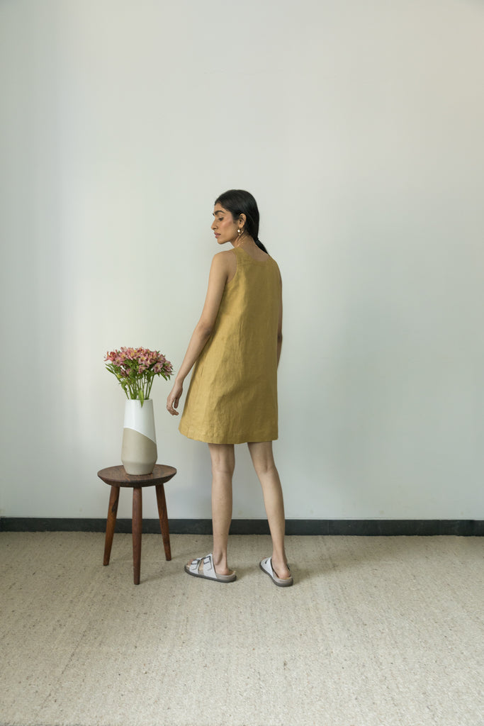 Yellow Flowy Mini Dress at Kamakhyaa by Anushé Pirani. This item is Casual Wear, Cotton, Cotton Hemp, Handwoven, Hemp, Mini Dresses, Regular Fit, Shibumi Collection, Sleeveless Dresses, Solids, Womenswear, Yellow