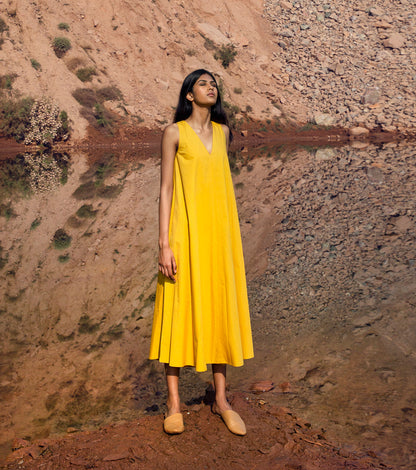 Yellow Midi Dress at Kamakhyaa by Khara Kapas. This item is 32 Days, Earth Party, Midi Dresses, Natural, Relaxed Fit, Resort Wear, Sleeveless Dresses, Solid Selfmade, Solids, Womenswear, Yellow