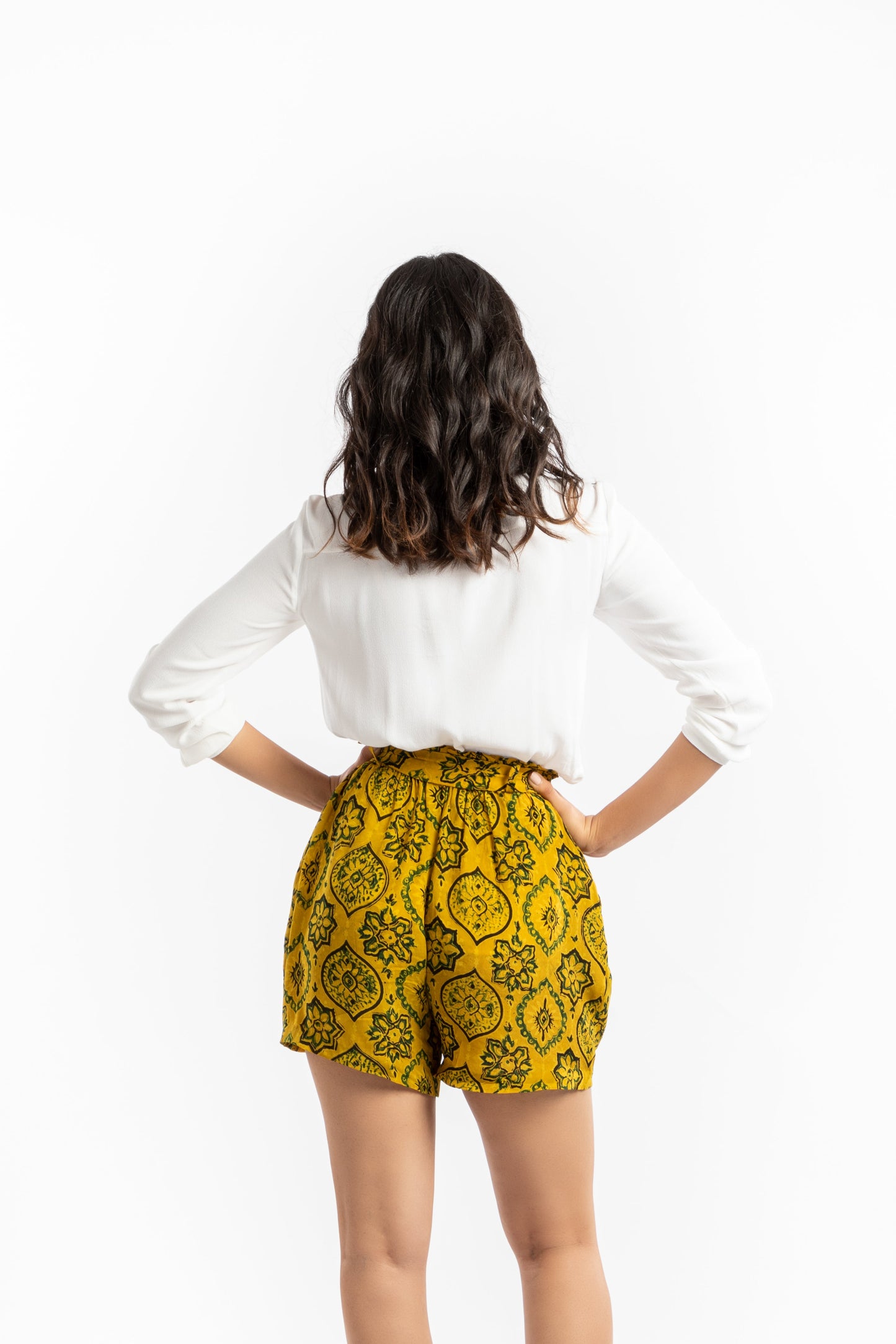 Yellow Paper Bag Shorts at Kamakhyaa by House Of Ara. This item is Ajrakh, Ajrakh Collection, Casual Wear, Cupro, Natural, Prints, Regular Fit, Shorts, Womenswear, Yellow