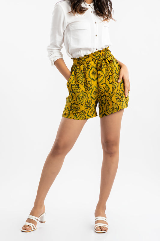 Yellow Paper Bag Shorts at Kamakhyaa by House Of Ara. This item is Ajrakh, Ajrakh Collection, Casual Wear, Cupro, Natural, Prints, Regular Fit, Shorts, Womenswear, Yellow