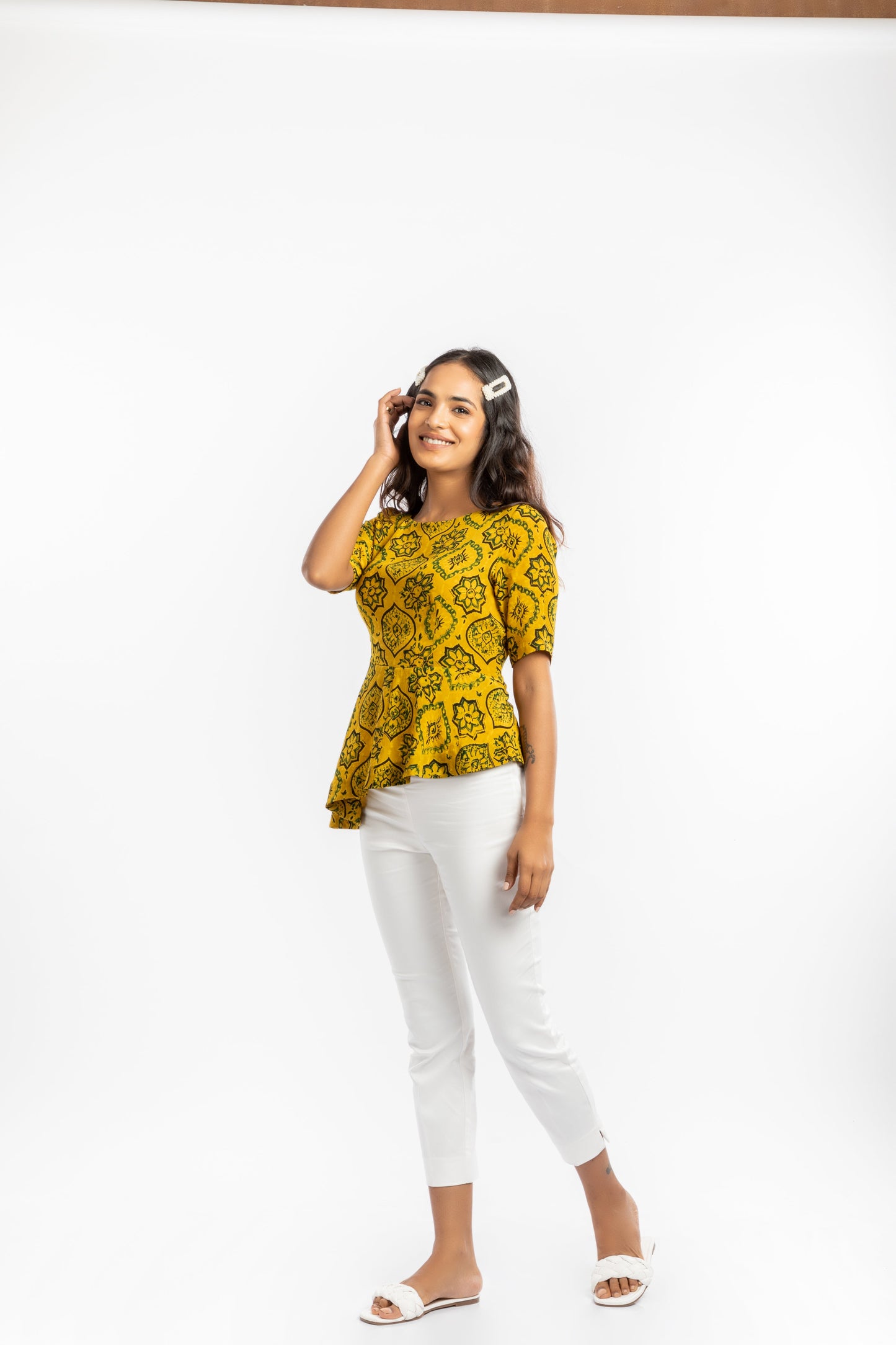 Yellow Peplum Top at Kamakhyaa by House Of Ara. This item is Ajrakh, Ajrakh Collection, Casual Wear, Cupro, Fitted at Bust, Natural, Peplum Tops, Prints, Womenswear, Yellow