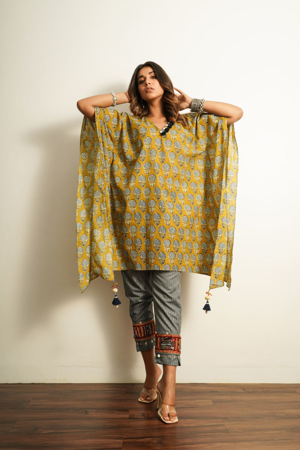 Yellow Printed Cotton Kaftan at Kamakhyaa by Keva. This item is 100% cotton, Best Selling, Fusion Wear, Kaftan Tops, Less than $50, Natural, New, Prints, Relaxed Fit, Saba, Womenswear, Yellow