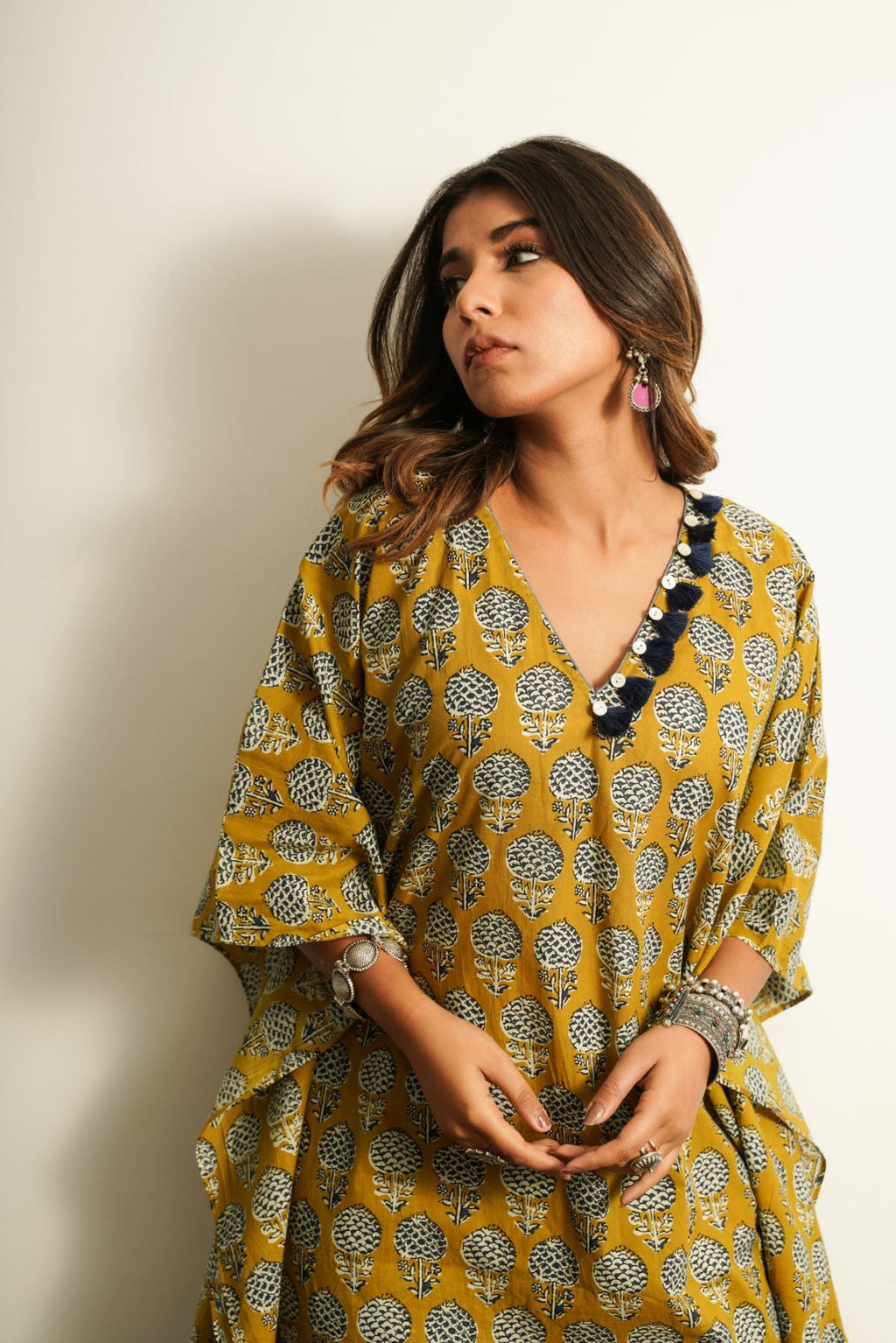 Yellow Printed Cotton Kaftan at Kamakhyaa by Keva. This item is 100% cotton, Best Selling, Fusion Wear, Kaftan Tops, Less than $50, Natural, New, Prints, Relaxed Fit, Saba, Womenswear, Yellow