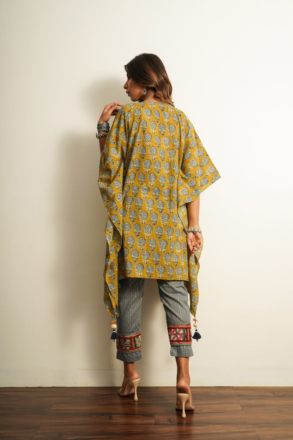 Yellow Printed Cotton Kaftan at Kamakhyaa by Keva. This item is 100% cotton, Best Selling, Fusion Wear, Kaftan Tops, Less than $50, Natural, New, Prints, Relaxed Fit, Saba, Womenswear, Yellow