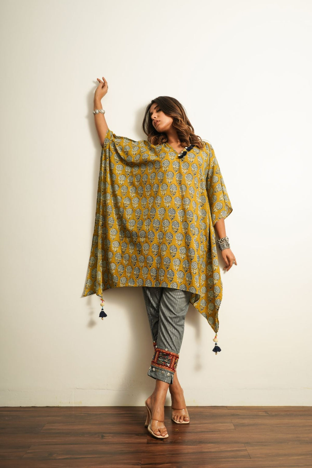Yellow Printed Cotton Kaftan at Kamakhyaa by Keva. This item is 100% cotton, Best Selling, Fusion Wear, Kaftan Tops, Less than $50, Natural, New, Prints, Relaxed Fit, Saba, Womenswear, Yellow