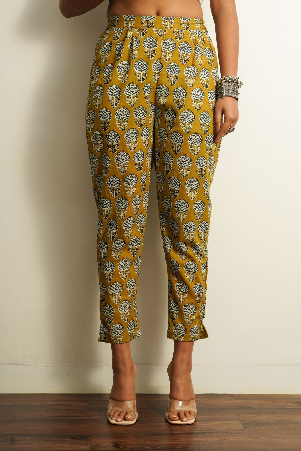 Yellow Printed Cotton Straight Pant at Kamakhyaa by Keva. This item is 100% cotton, Capris, Fusion Wear, Less than $50, Natural, New, Prints, Products less than $25, Regular Fit, Saba, Womenswear, Yellow