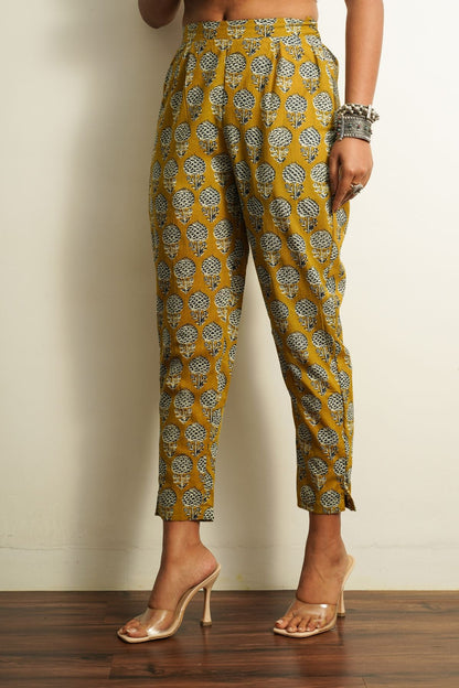 Yellow Printed Cotton Straight Pant at Kamakhyaa by Keva. This item is 100% cotton, Capris, Fusion Wear, Less than $50, Natural, New, Prints, Products less than $25, Regular Fit, Saba, Womenswear, Yellow