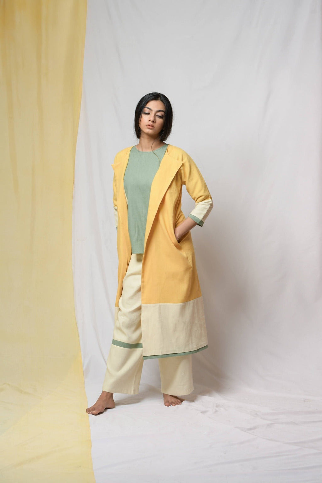 Yellow Roving Dunes Jacket at Kamakhyaa by Niraa. This item is Coats, Cotton khadi, Evening Wear, Natural with azo dyes, Relaxed Fit, Solids, Tales of rippling brooks, Womenswear, Yellow