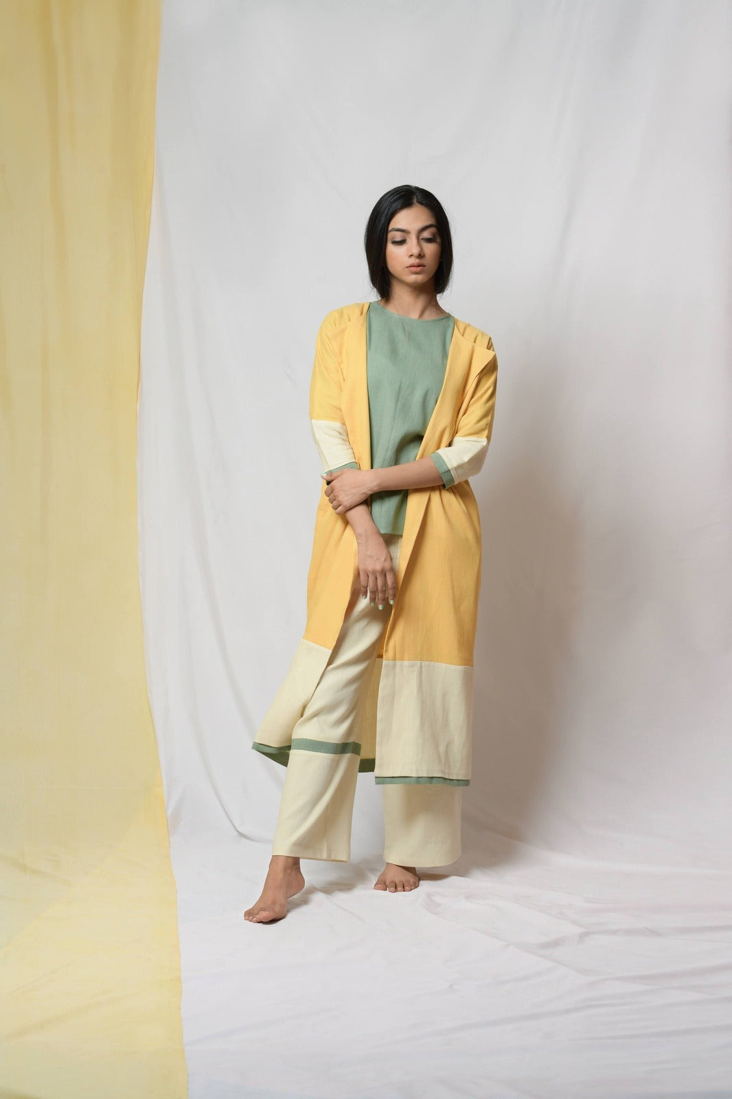 Yellow Roving Dunes Jacket at Kamakhyaa by Niraa. This item is Coats, Cotton khadi, Evening Wear, Natural with azo dyes, Relaxed Fit, Solids, Tales of rippling brooks, Womenswear, Yellow