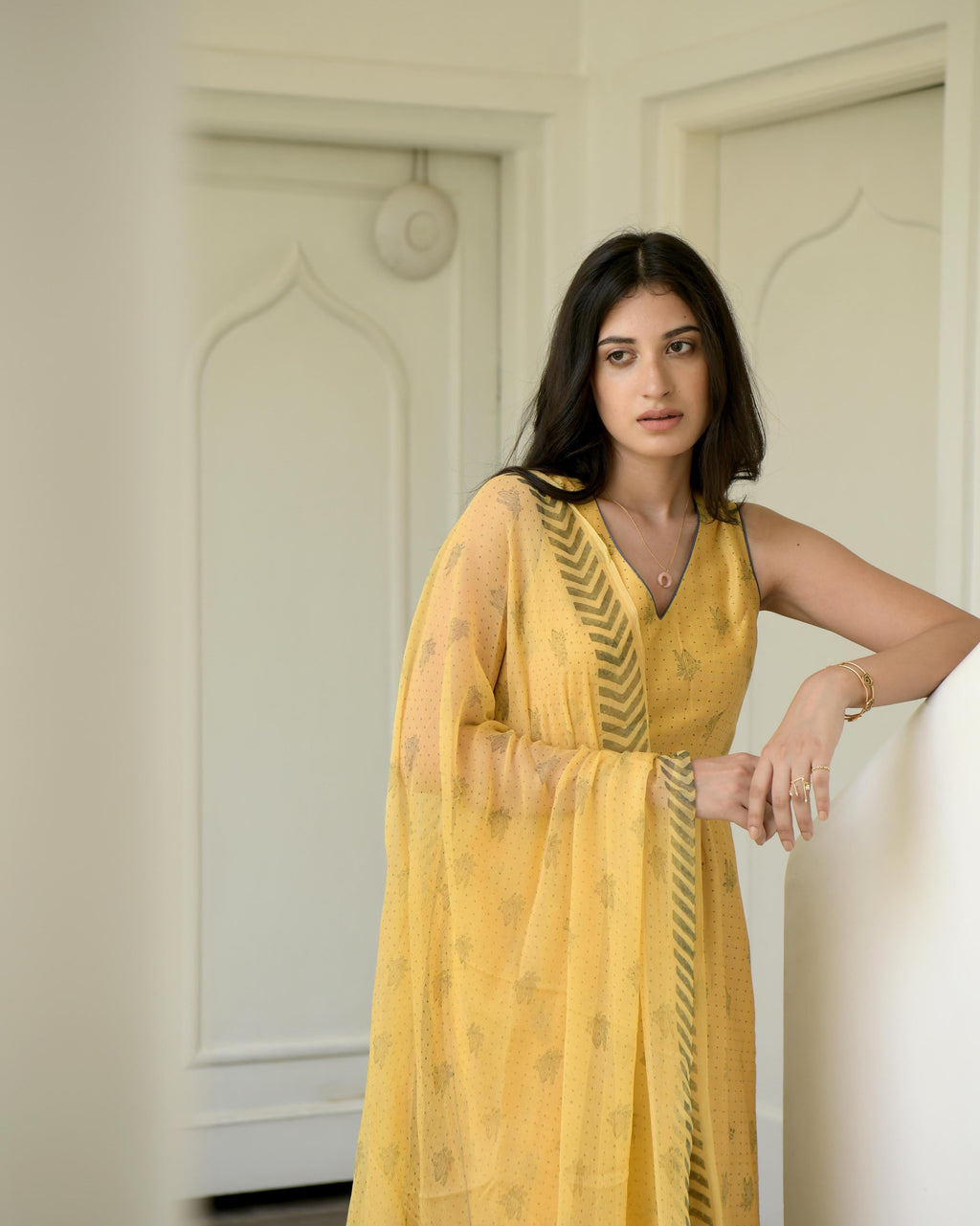 Yellow Sleeveless Chanderi Silk Kurta Set With Dupatta at Kamakhyaa by Taro. This item is Best Selling, Evening Wear, Gulzar Taro, Handwoven Chanderi silk, Indian Wear, July Sale, July Sale 2023, Kurta Pant Sets, Kurta Set With Dupatta, Natural, Prints, Regular Fit, Womenswear, Yellow