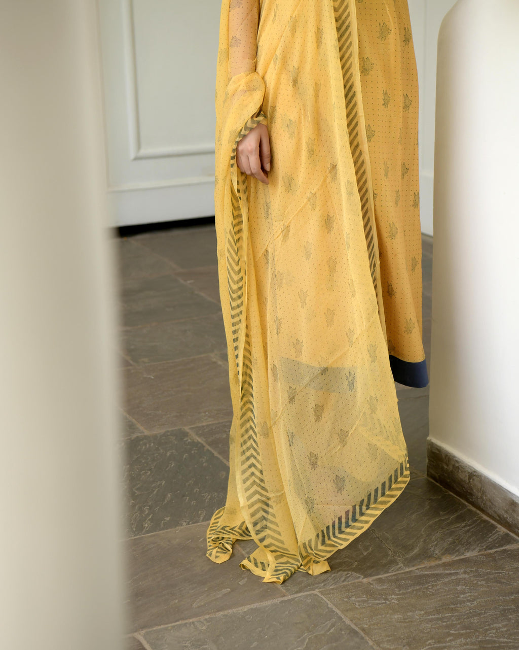 Yellow Sleeveless Chanderi Silk Kurta Set With Dupatta at Kamakhyaa by Taro. This item is Best Selling, Evening Wear, Gulzar Taro, Handwoven Chanderi silk, Indian Wear, July Sale, July Sale 2023, Kurta Pant Sets, Kurta Set With Dupatta, Natural, Prints, Regular Fit, Womenswear, Yellow