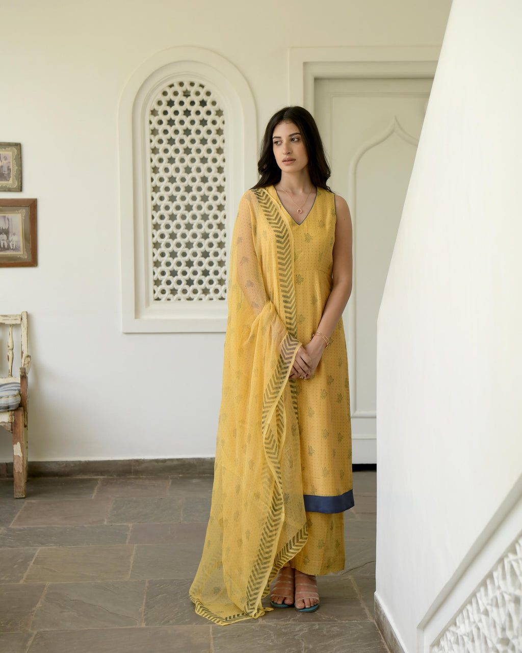 Yellow Sleeveless Chanderi Silk Kurta Set With Dupatta at Kamakhyaa by Taro. This item is Best Selling, Evening Wear, Gulzar Taro, Handwoven Chanderi silk, Indian Wear, July Sale, July Sale 2023, Kurta Pant Sets, Kurta Set With Dupatta, Natural, Prints, Regular Fit, Womenswear, Yellow