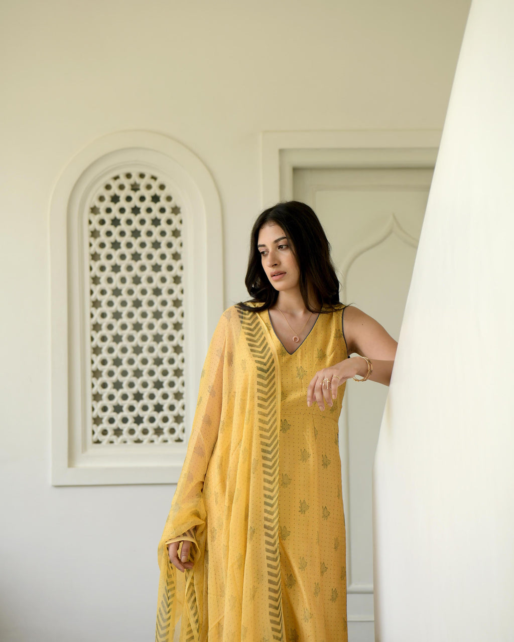 Yellow Sleeveless Chanderi Silk Kurta Set With Dupatta at Kamakhyaa by Taro. This item is Best Selling, Evening Wear, Gulzar Taro, Handwoven Chanderi silk, Indian Wear, July Sale, July Sale 2023, Kurta Pant Sets, Kurta Set With Dupatta, Natural, Prints, Regular Fit, Womenswear, Yellow