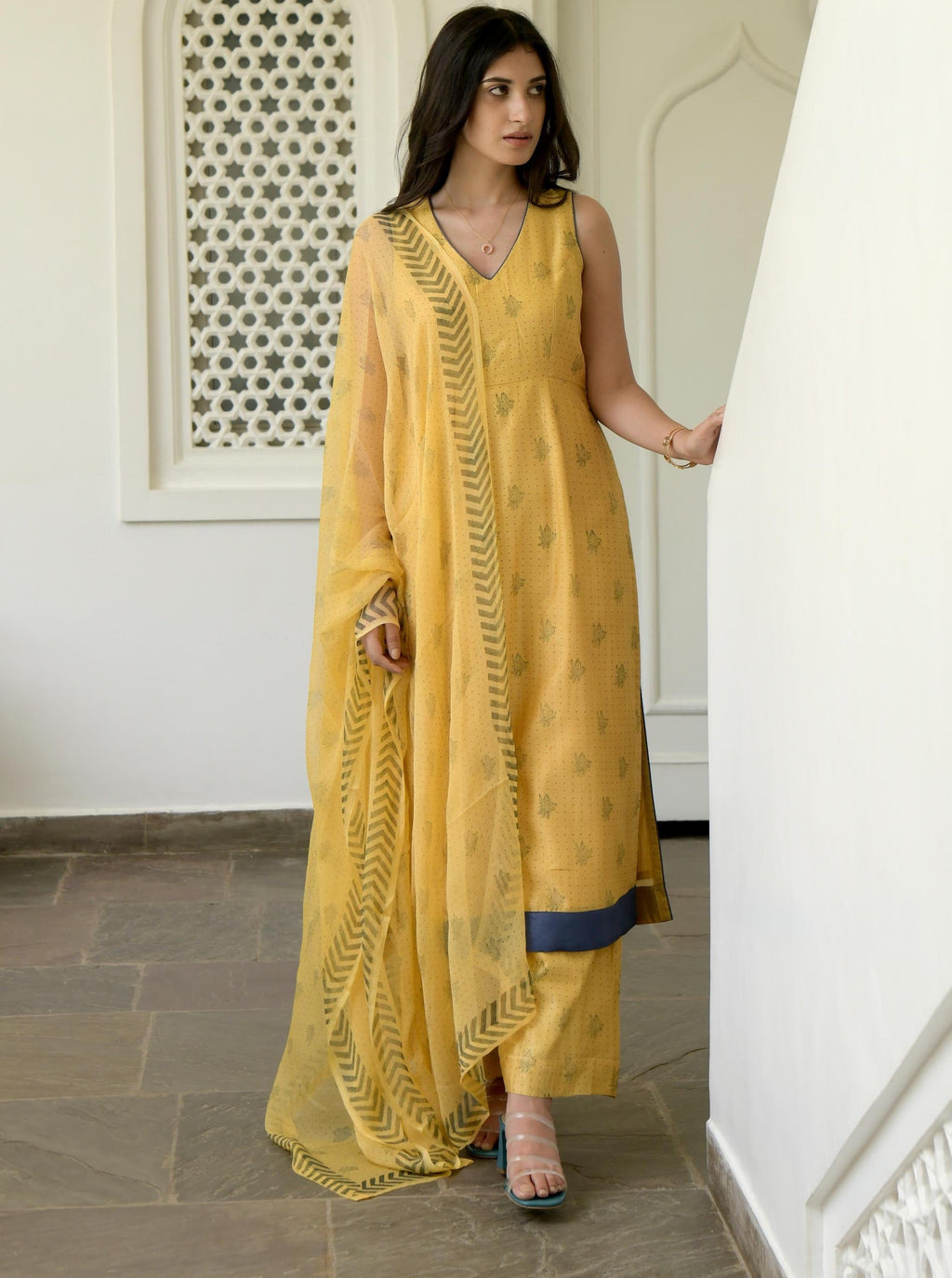Yellow Sleeveless Chanderi Silk Kurta Set With Dupatta at Kamakhyaa by Taro. This item is Best Selling, Evening Wear, Gulzar Taro, Handwoven Chanderi silk, Indian Wear, July Sale, July Sale 2023, Kurta Pant Sets, Kurta Set With Dupatta, Natural, Prints, Regular Fit, Womenswear, Yellow