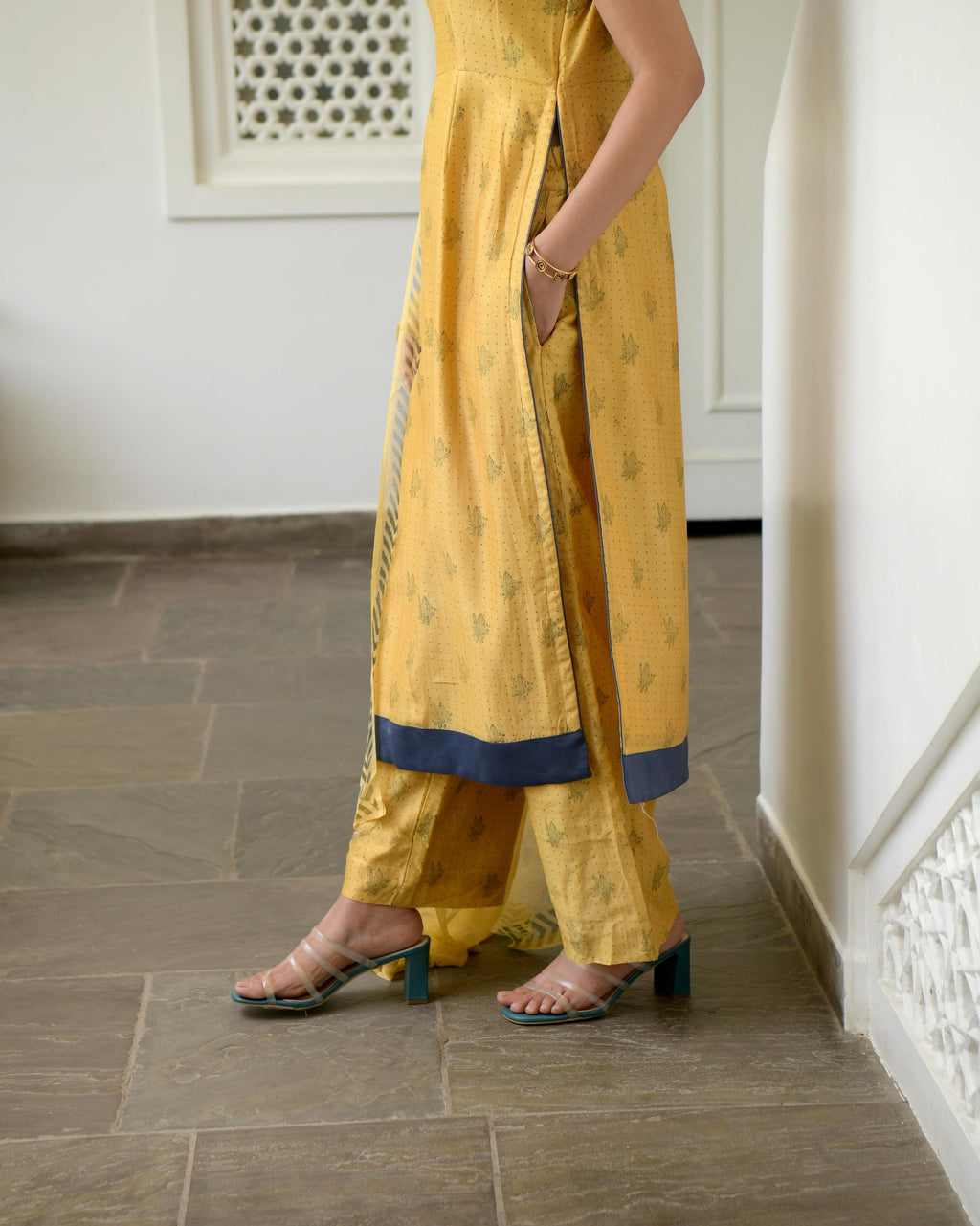 Yellow Sleeveless Chanderi Silk Kurta Set With Dupatta at Kamakhyaa by Taro. This item is Best Selling, Evening Wear, Gulzar Taro, Handwoven Chanderi silk, Indian Wear, July Sale, July Sale 2023, Kurta Pant Sets, Kurta Set With Dupatta, Natural, Prints, Regular Fit, Womenswear, Yellow