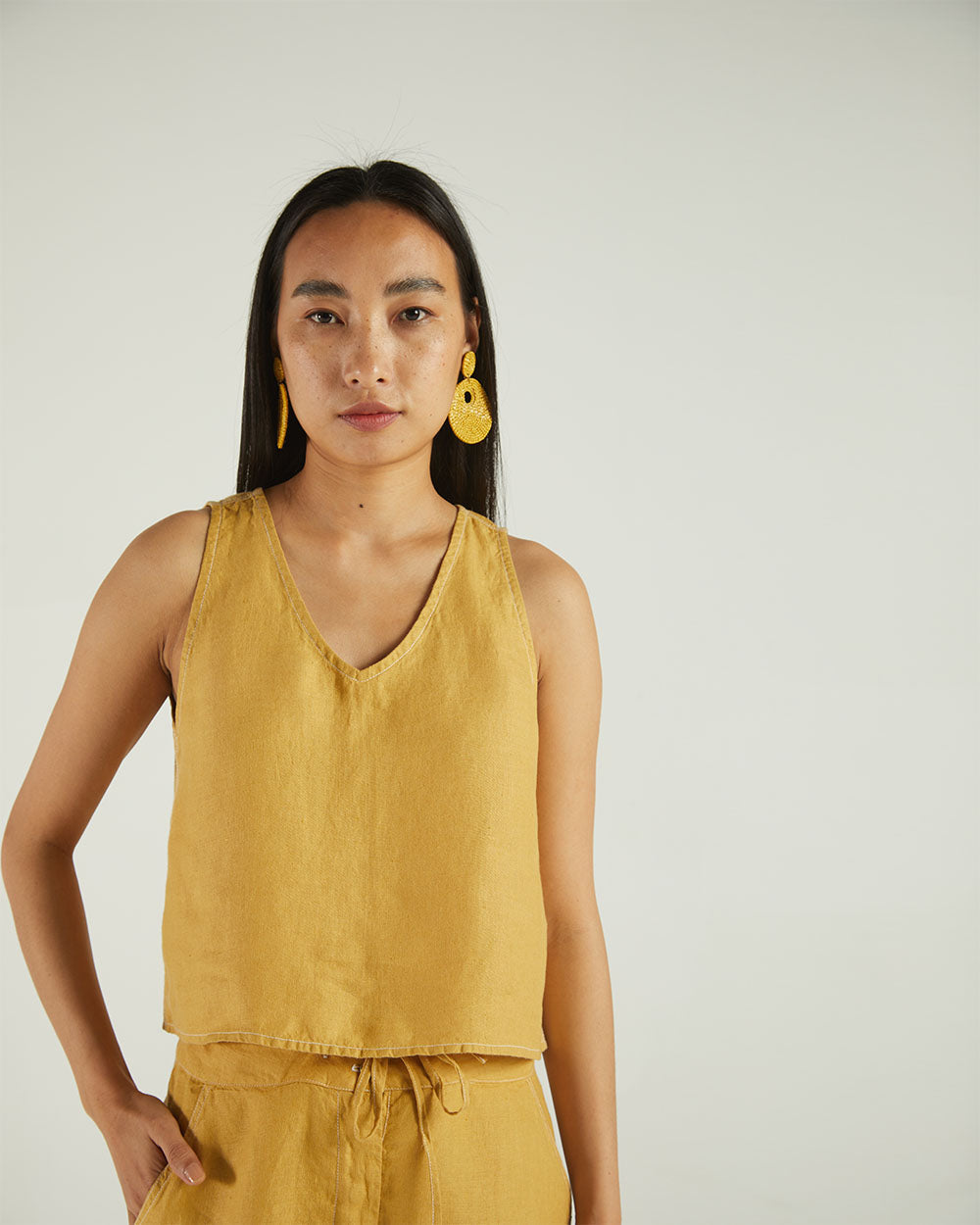 Yellow Sleeveless Crop Top at Kamakhyaa by Reistor. This item is Bemberg, Casual Wear, Crop Tops, Hemp, Natural, Solids, Tops, Womenswear