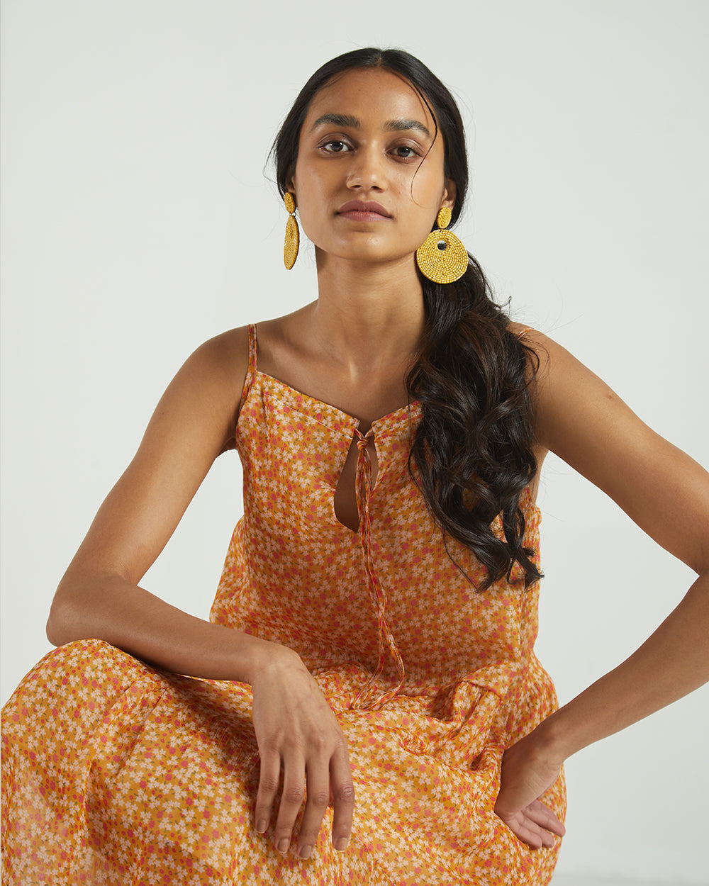 Yellow Sleeveless Tier Dress at Kamakhyaa by Reistor. This item is Bemberg, Best Selling, Casual Wear, Chiffon, Mini Dresses, Natural, Sleeveless Dresses, Tiered Dresses, Womenswear, Yellow
