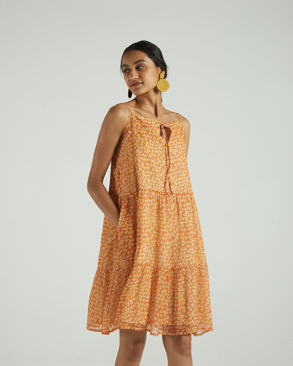 Yellow Sleeveless Tier Dress at Kamakhyaa by Reistor. This item is Bemberg, Best Selling, Casual Wear, Chiffon, Mini Dresses, Natural, Sleeveless Dresses, Tiered Dresses, Womenswear, Yellow