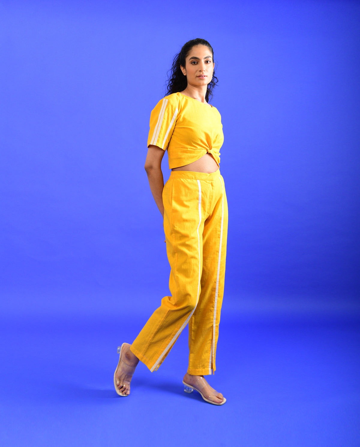 Yellow Solid Co-ord Set at Kamakhyaa by Rias Jaipur. This item is Casual Wear, Co-ord Sets, Handloom Cotton, Handspun, Handwoven, Hue, Regular Fit, Solids, Stripes, Travel, Travel Co-ords, Womenswear, Yellow