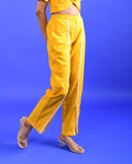 Yellow Solid Pants at Kamakhyaa by Rias Jaipur. This item is Casual Wear, Handloom Cotton, Handspun, Handwoven, Hue, Pants, Regular Fit, Solids, Stripes, Womenswear, Yellow