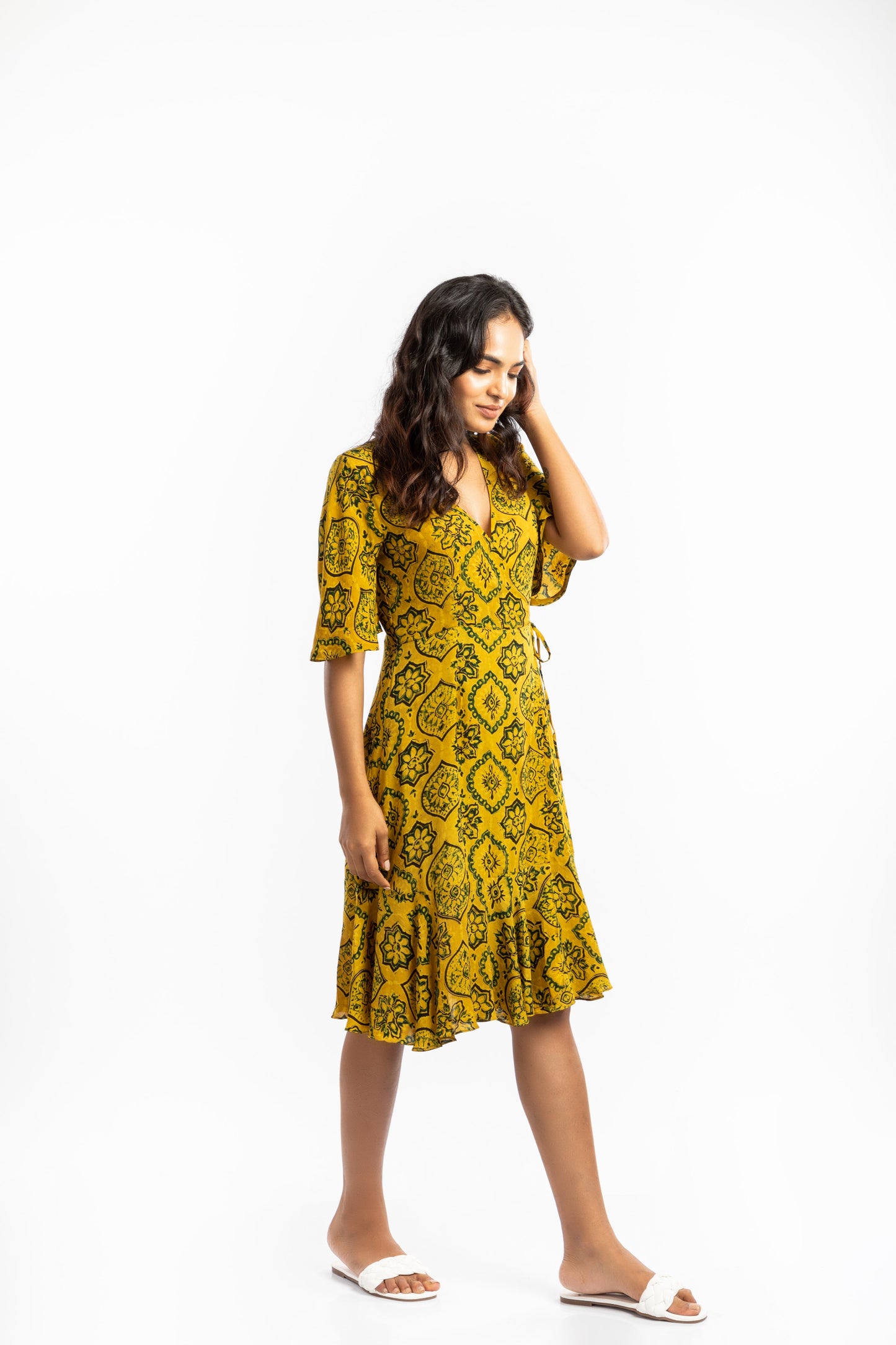 Yellow Wrap Dress at Kamakhyaa by House Of Ara. This item is Ajrakh, Ajrakh Collection, Casual Wear, Cupro, Natural, Prints, Regular Fit, Womenswear, Wrap Dresses, Yellow